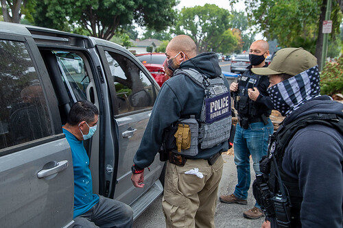 ICE ERO officers conducting a targeted enforcement operation